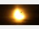 Partielle Sonnenfinsternis hinter Wolken