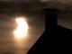 Partielle Sonnenfinsternis hinter Wolken